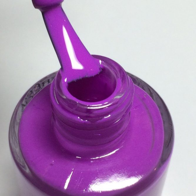 Peace bottle macro - bright neon purple nail polish