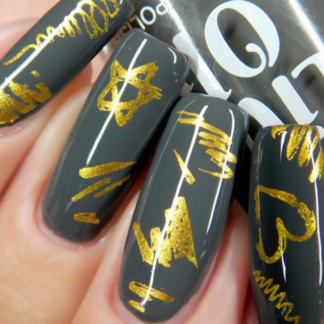 Charlotte - A charcoal grey nail polish with gold nail art