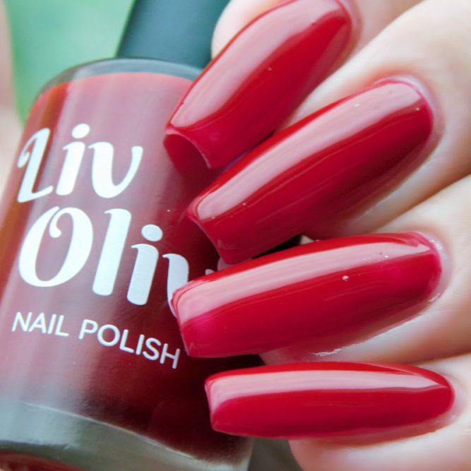 Scarlett red nail polish closeup